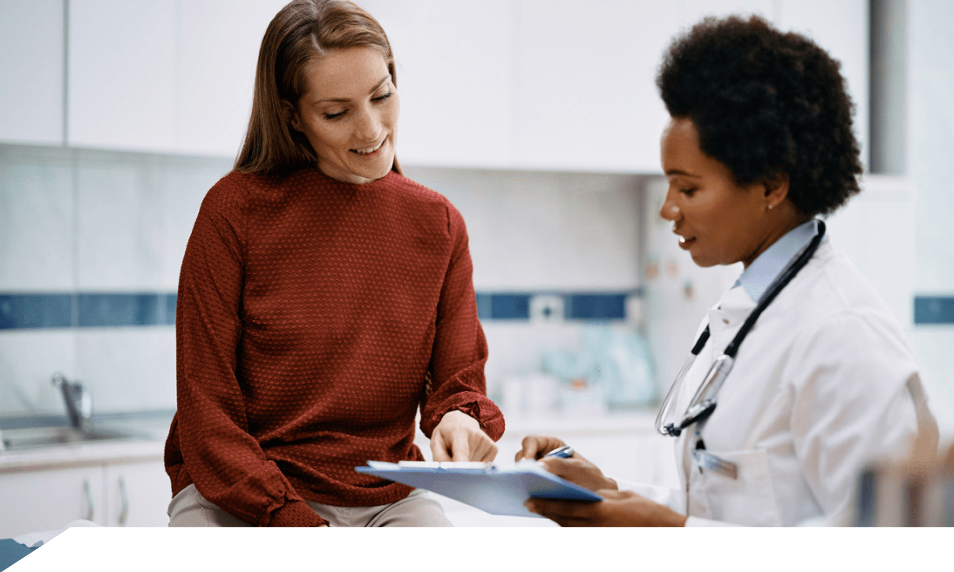 A woman talking with her doctor
