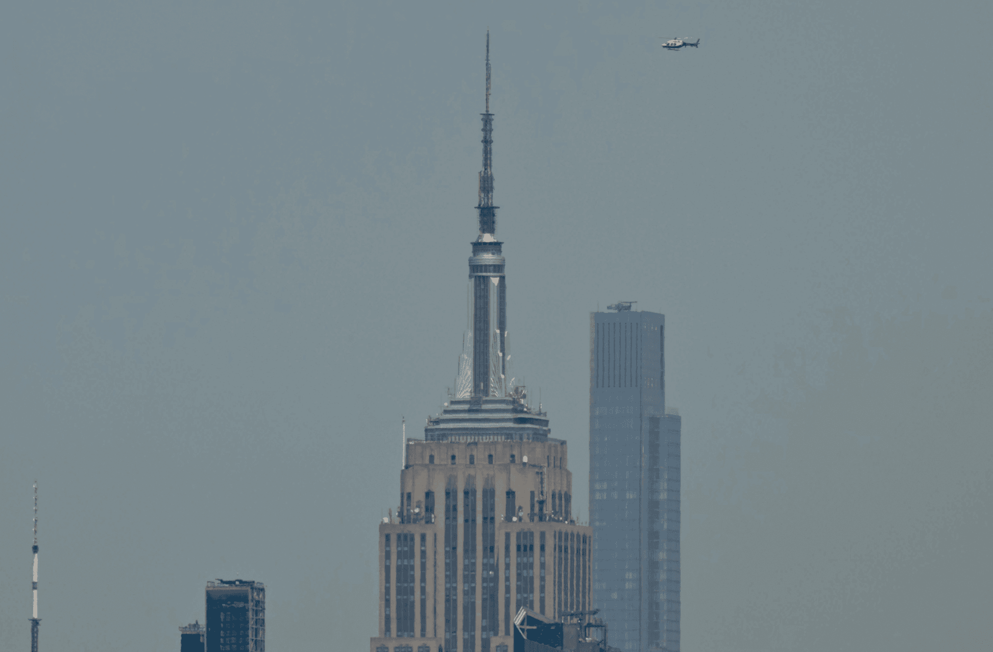masked climbers scale empire state building