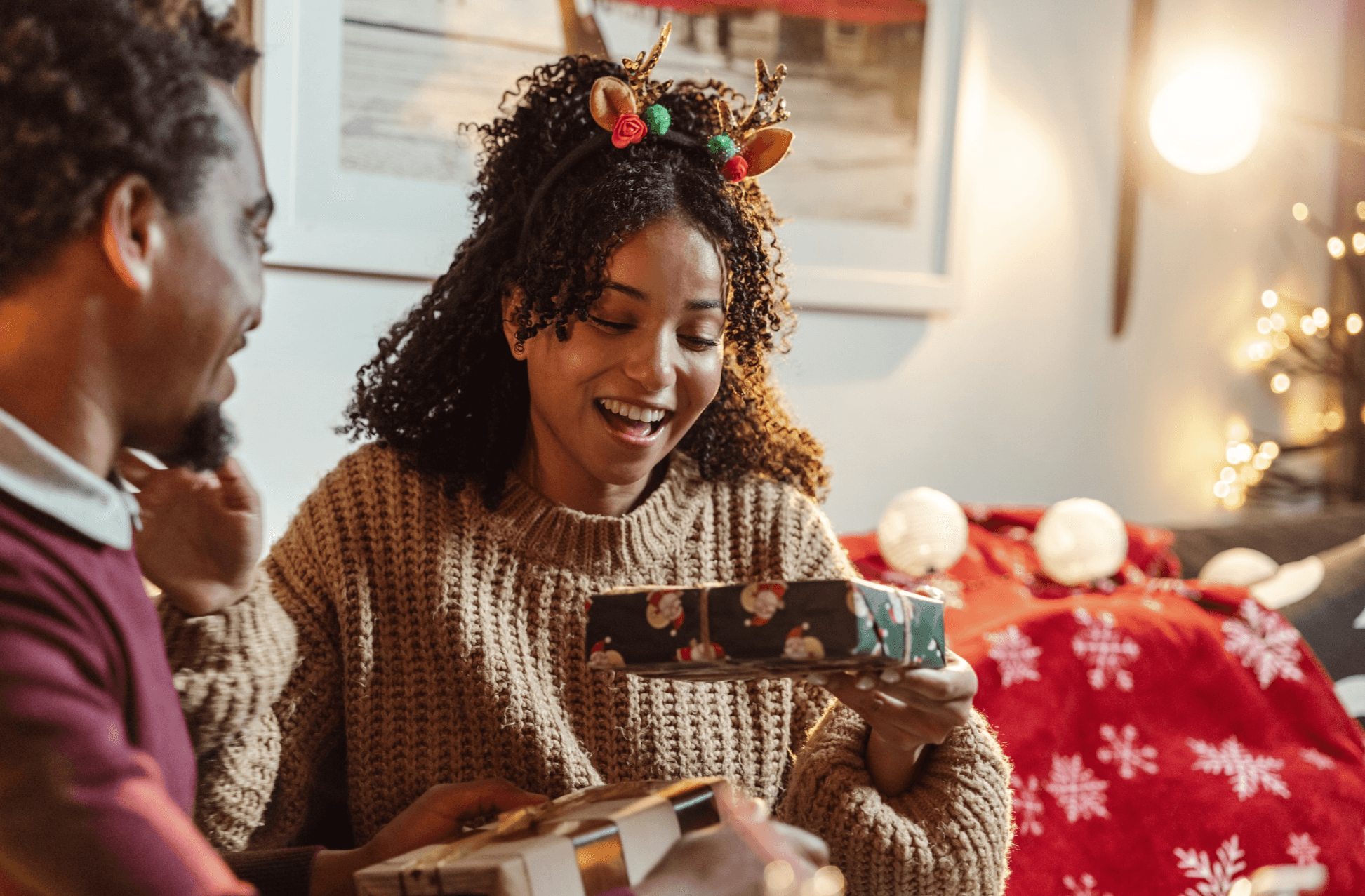 Friends exchanging holiday presents