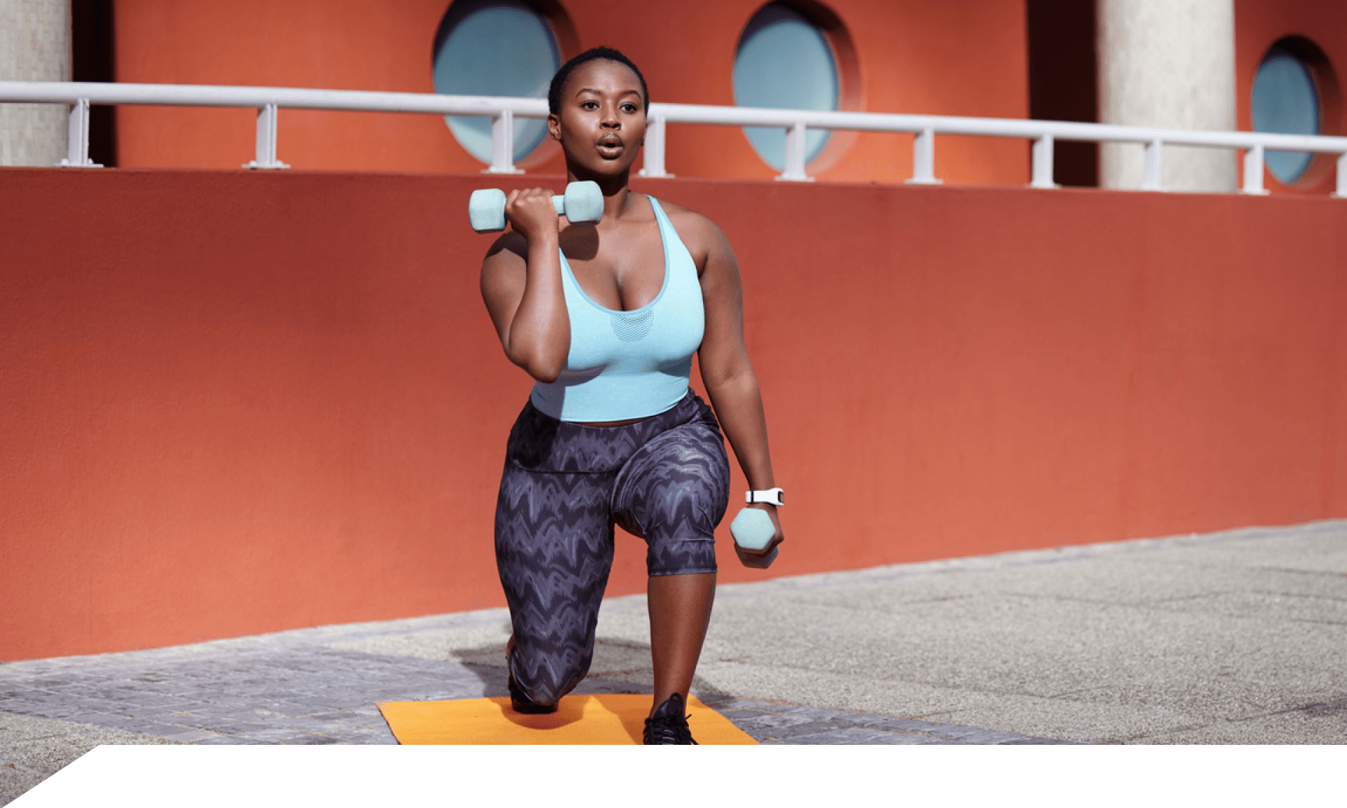 Woman doing body-weight squats at home