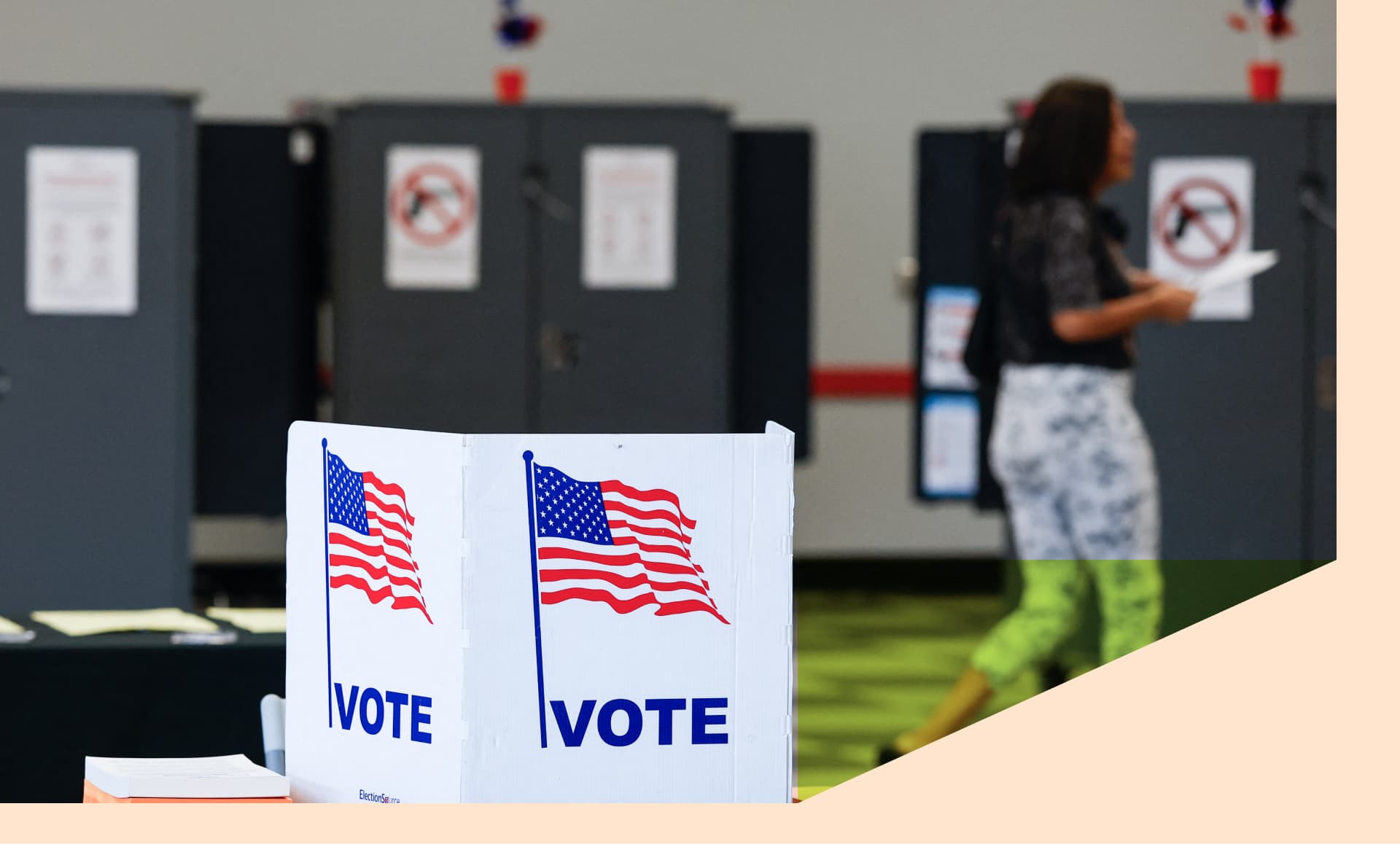 People vote at a polling location during early voting in the midterm election