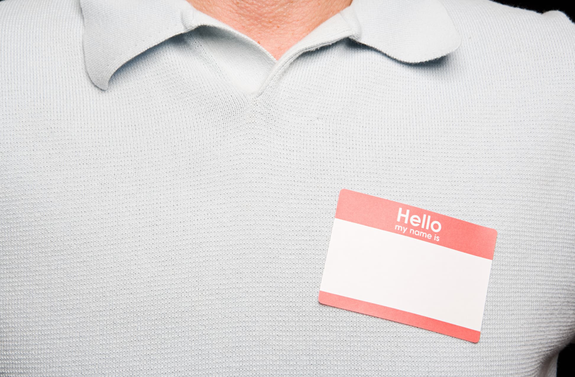 Man wearing blank name tag