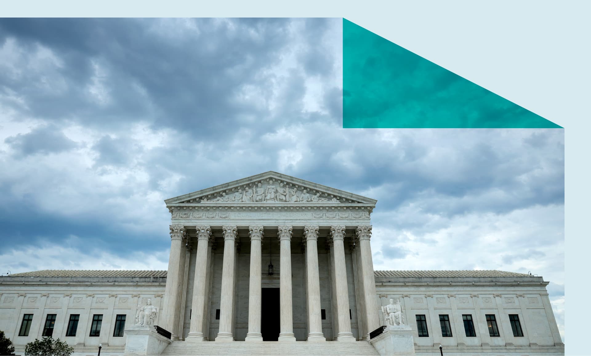 Supreme Court building with storm clouds above building.