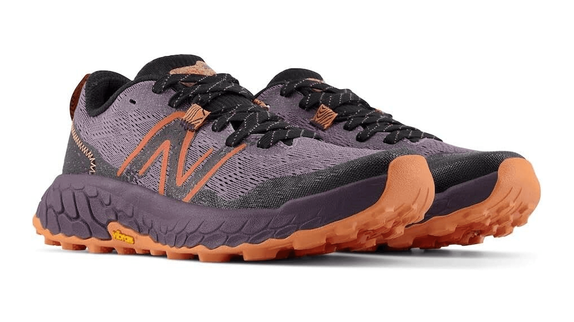 Purple sneakers with orange soles