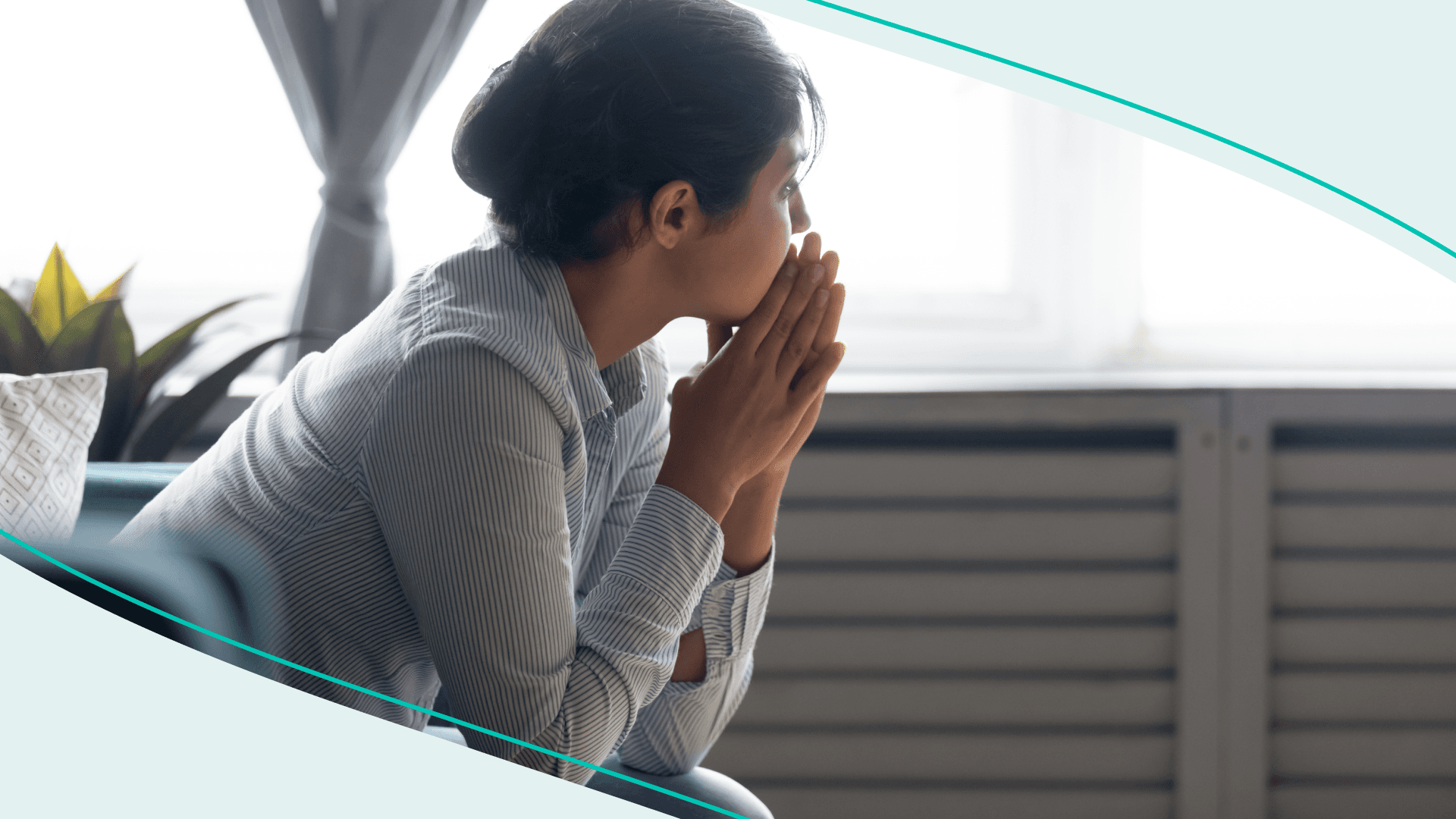 A woman looks away, pensive