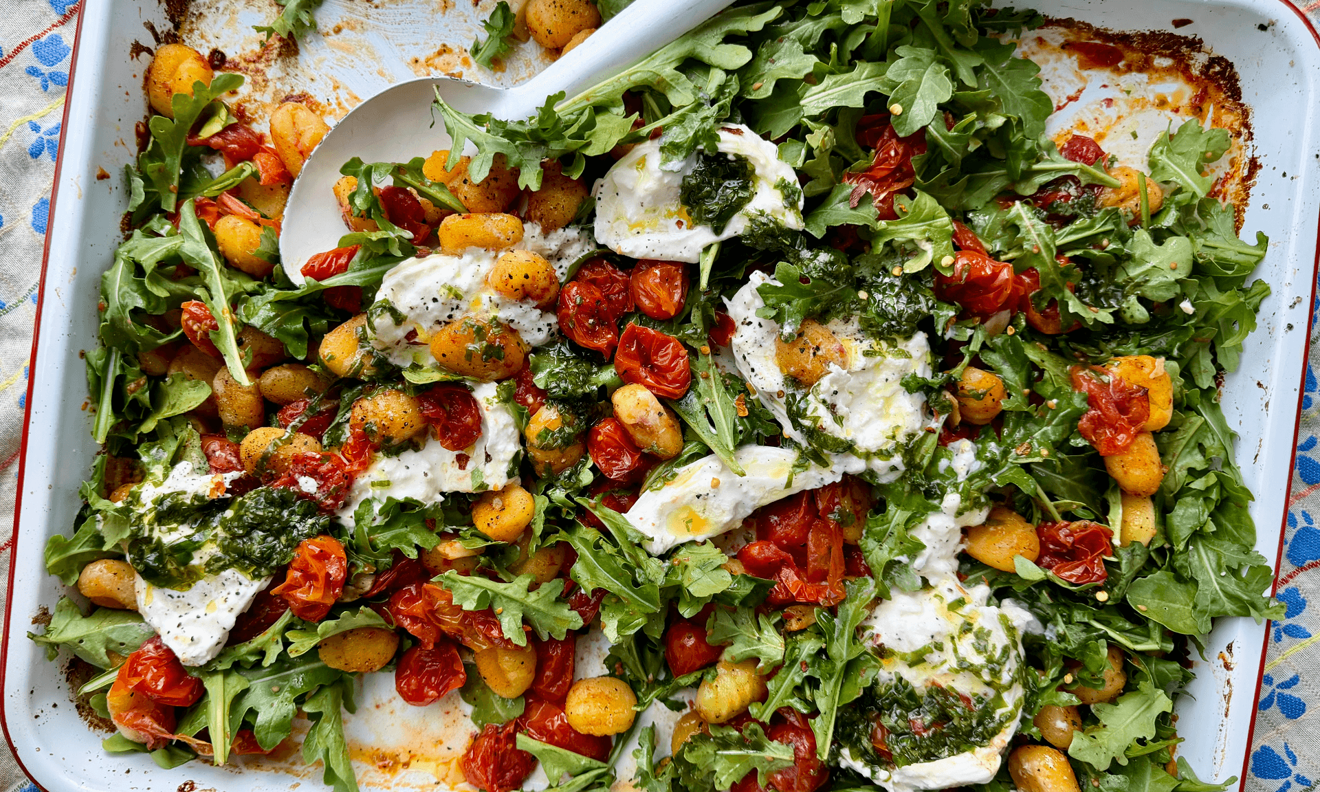 Dan Pelosi’s Sheet Pan Gnocchi with Roasted Tomatoes, Arugula, and Burrata
