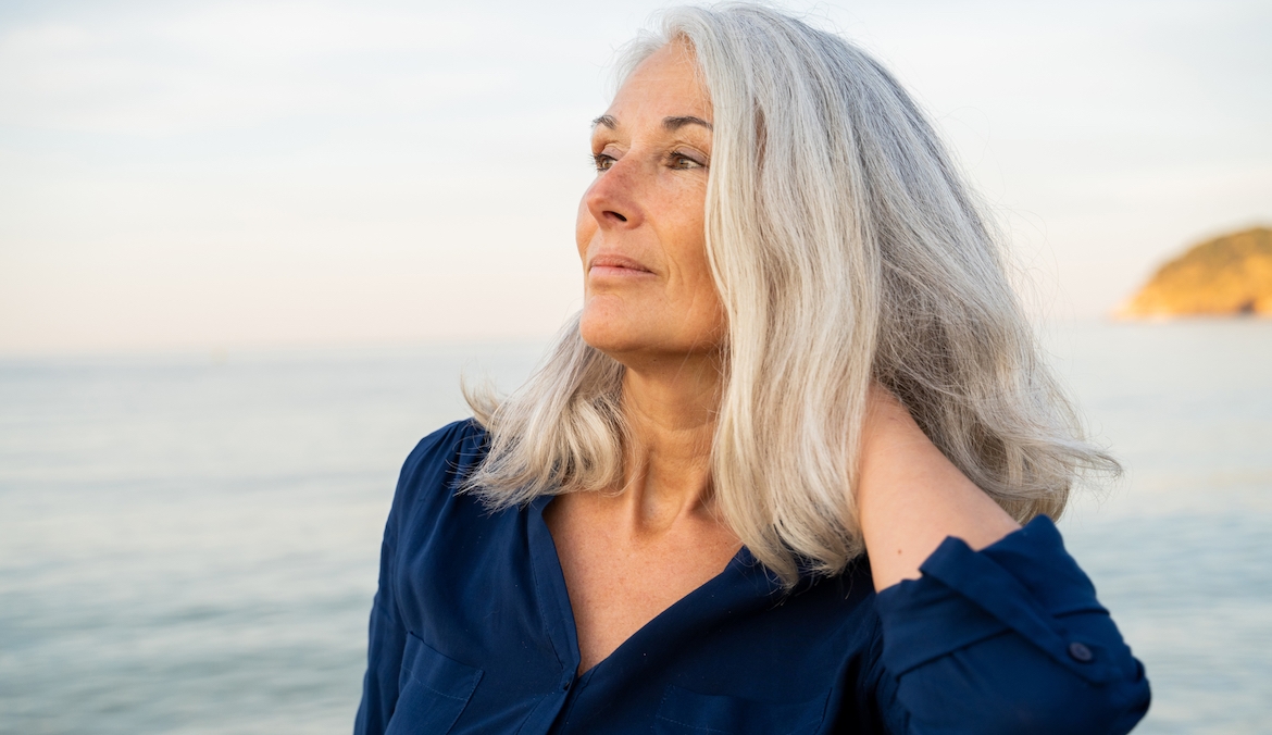 Featured image for Nearly a Decade After Embracing My Gray Hair at 50, I Decided To Start Dyeing It Again—And That's Just Fine