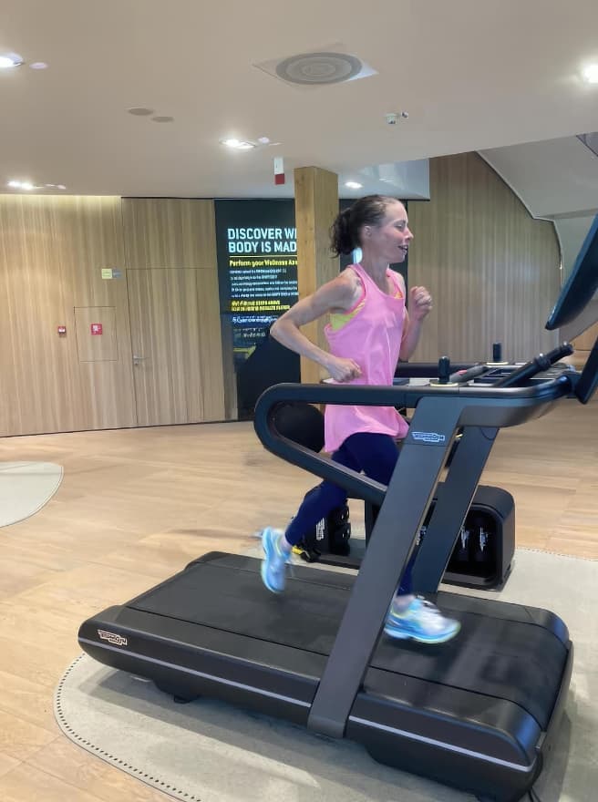 Author running on Technogym treadmill