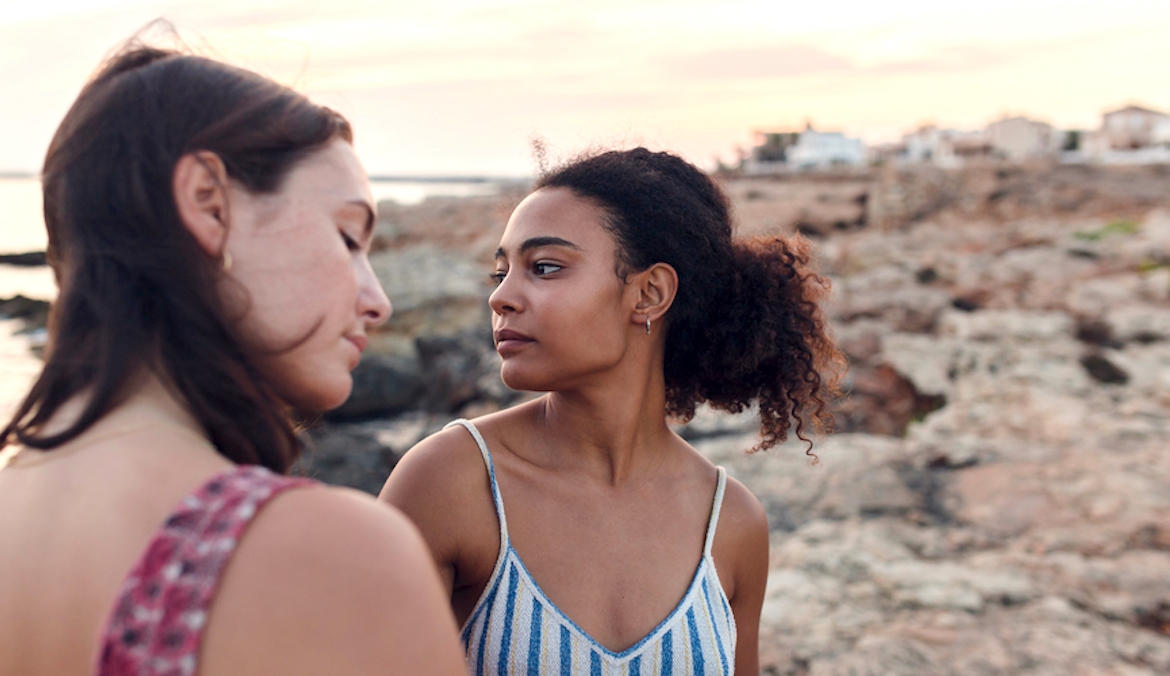 Featured image for 3 Telltale Signs That Someone Is Jealous of You—And How To Deal, According to Experts