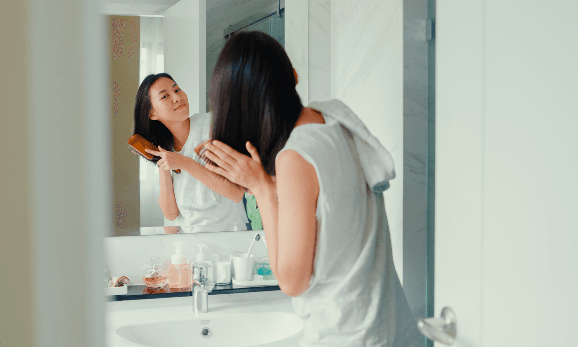woman brushing hair