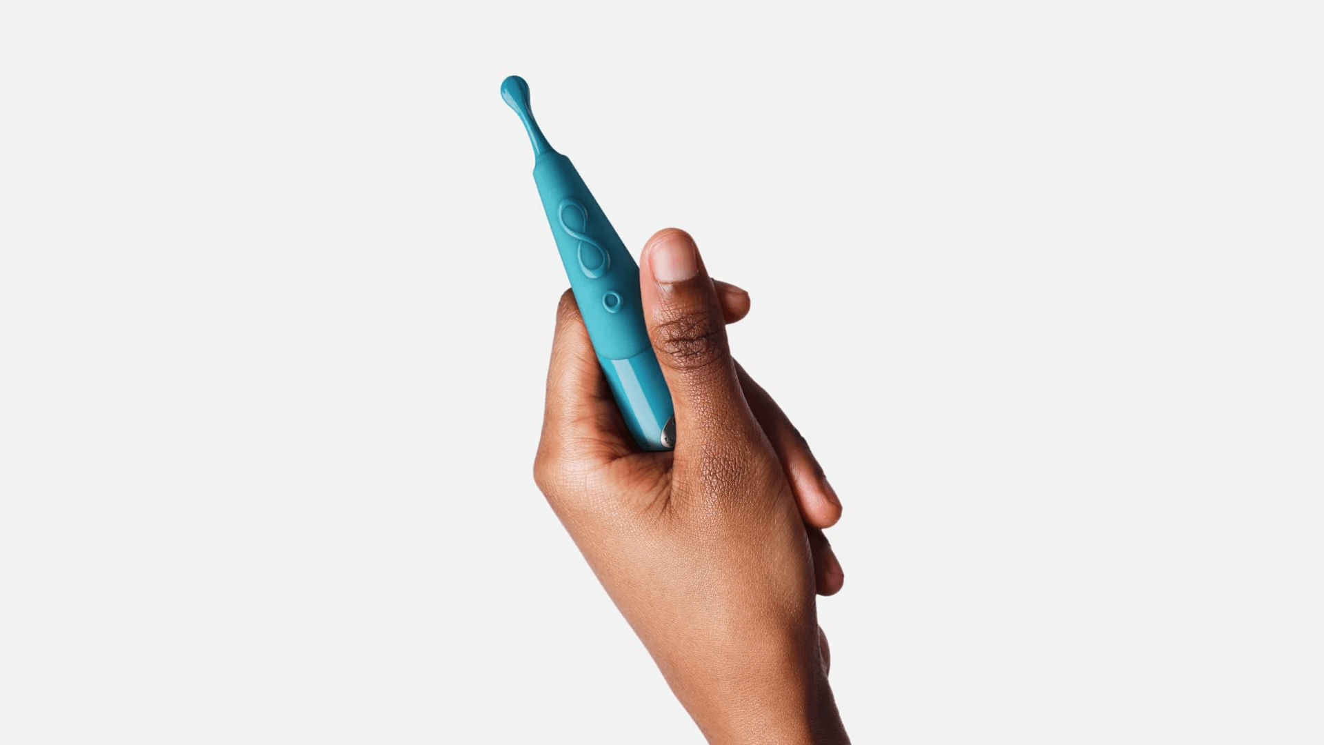 Hand holding slim teal vibrator with petite rounded end