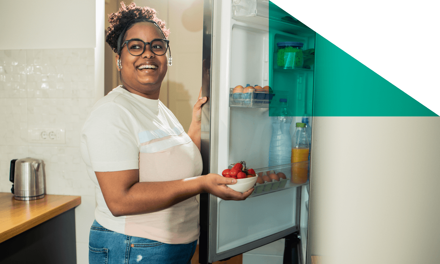 woman opening the fridge