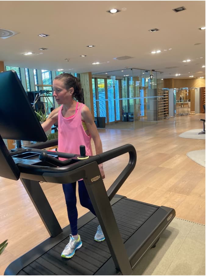 Author using Technogym treadmill