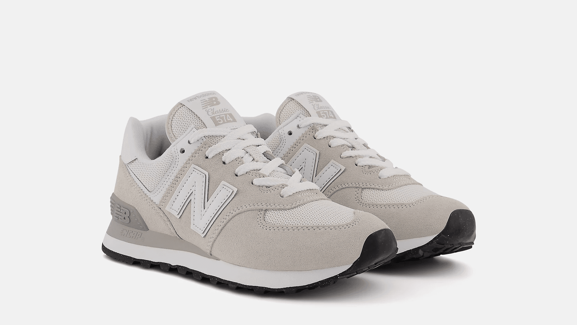 Taupe sneakers with white logo and laces