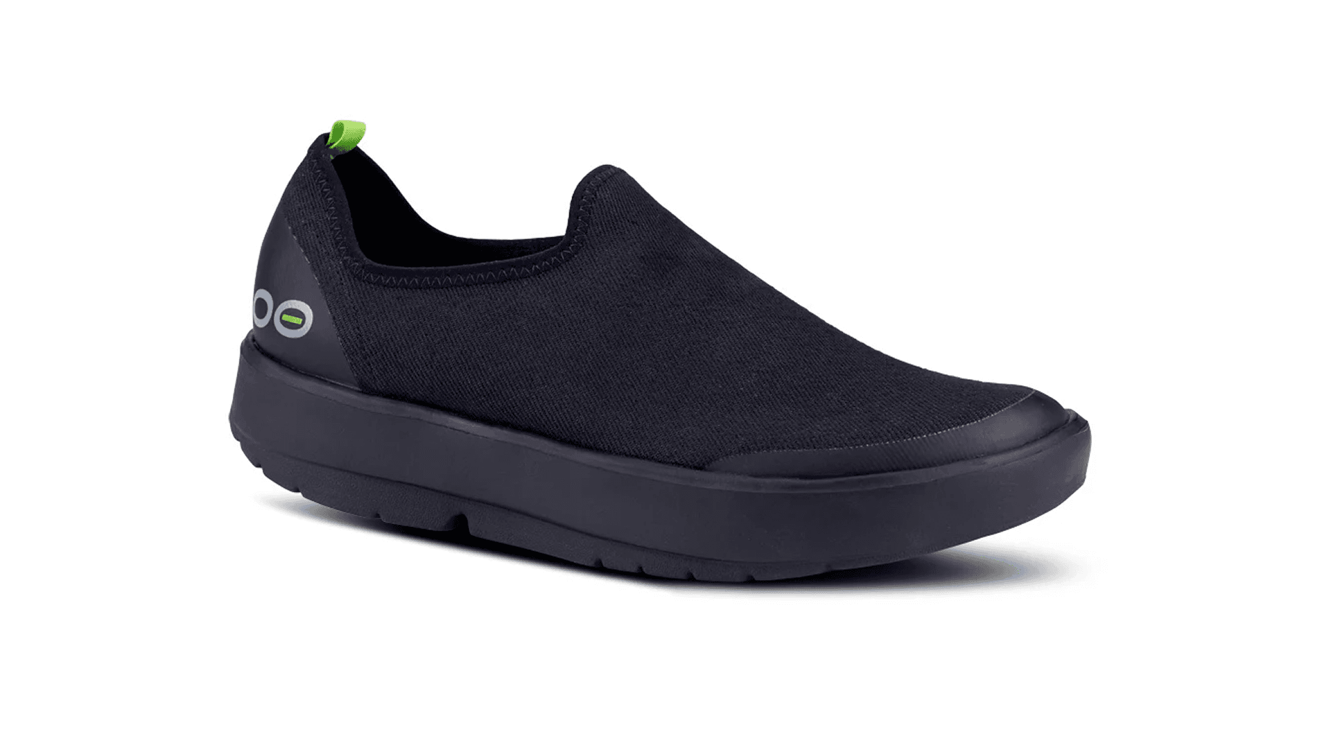 Black sneaker with neon green tag