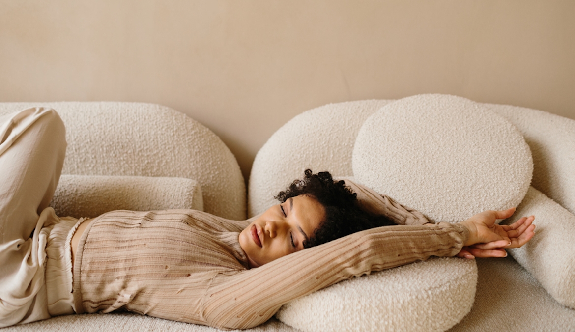 Featured image for Feel Deep-in-Your-Bones Exhausted Right Before Your Period? Here's Why